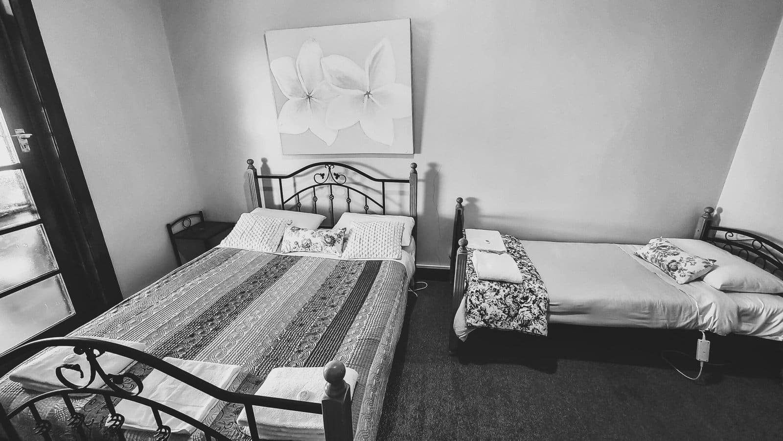 Room 5 - Queen + Single + Balcony